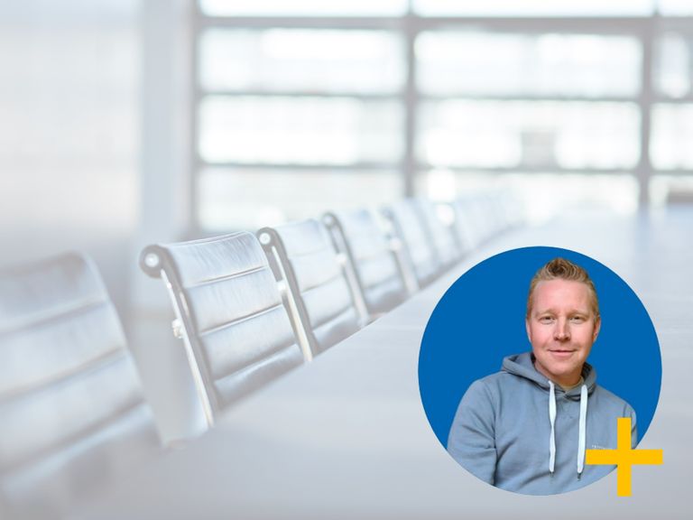 Matt Knibbs image overlayed on a board room table background